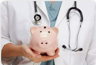 A doctor holding a piggy bank

Description automatically generated